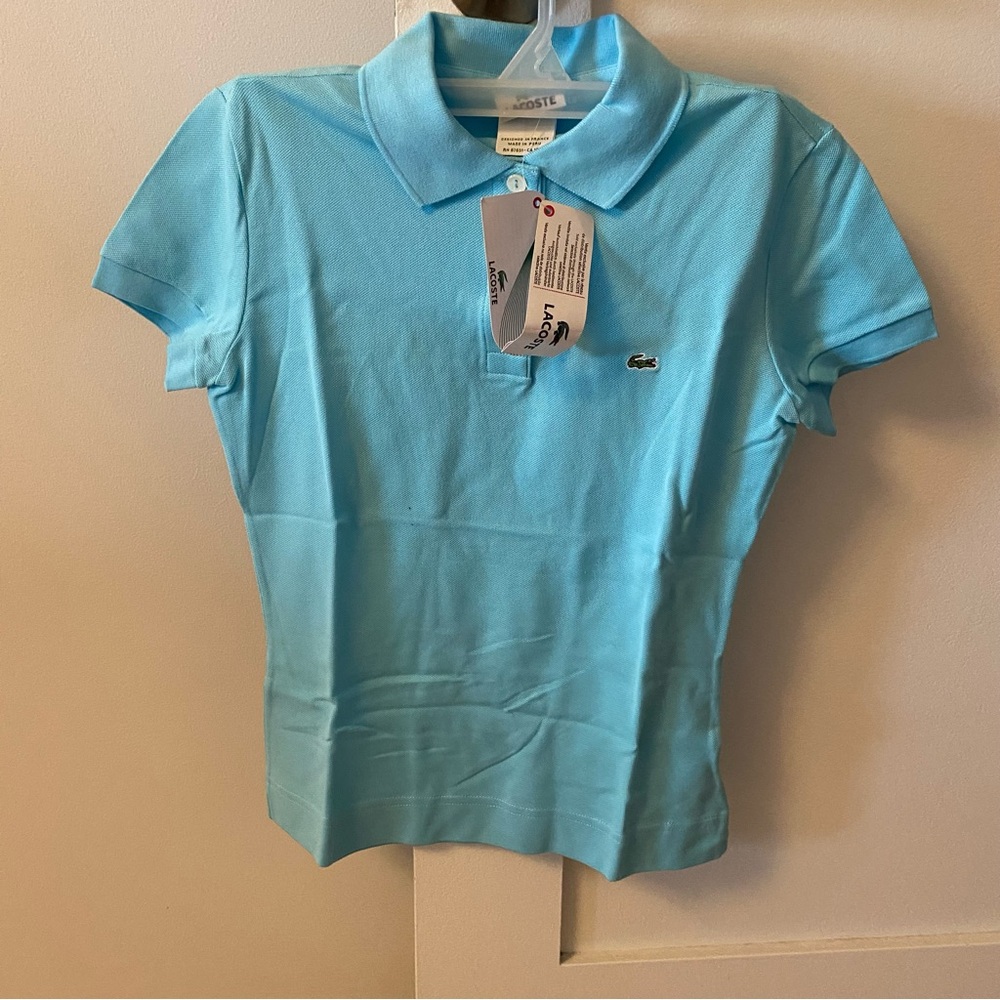 NWT cropped Lacoste polo shirt in sky blue color and size 4